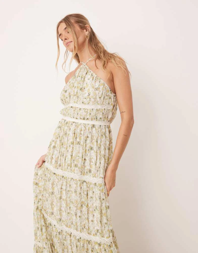 Shop ASOS DESIGN halter maxi dress with embroidery trim in ditsy floral  print on Sale at BeyondStyle  Get 60% Off ASOS DESIGN halter maxi dress  with embroidery trim in ditsy floral