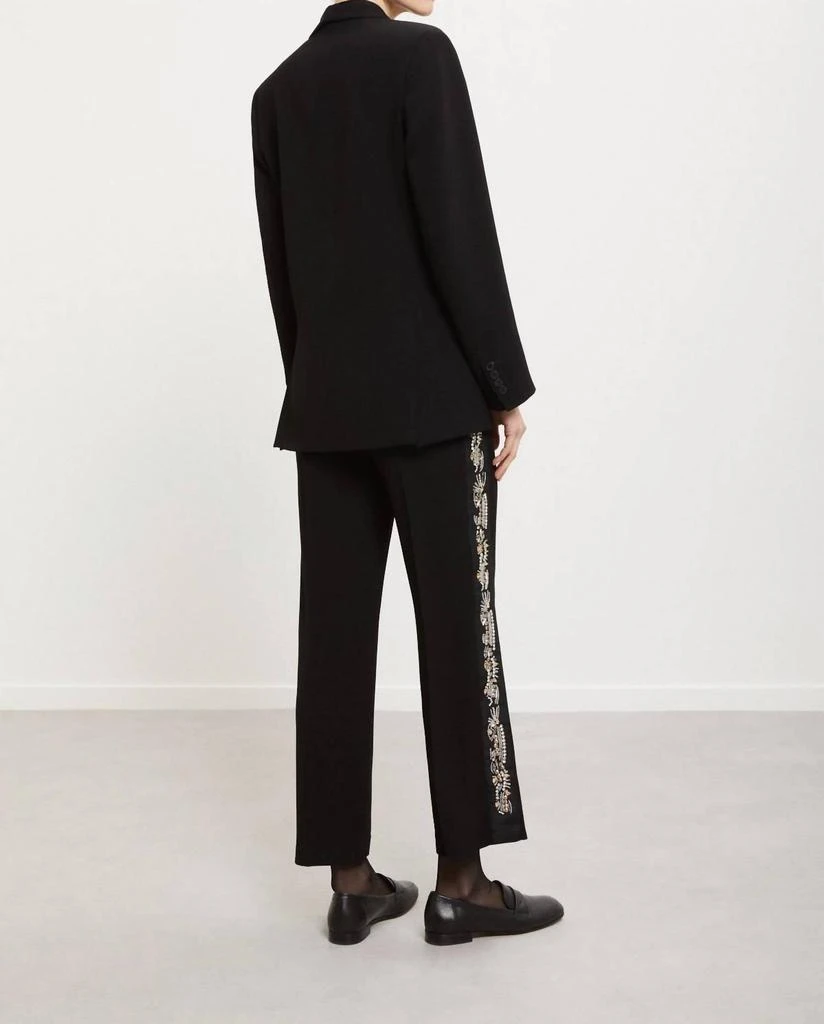 Ottod
Ame Ottod
Ame - Embroidered Palazzo Trousers 3