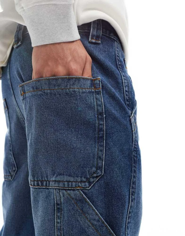 ASOS ASOS DESIGN straight leg jeans with carpenter detail in mid wash blue 4