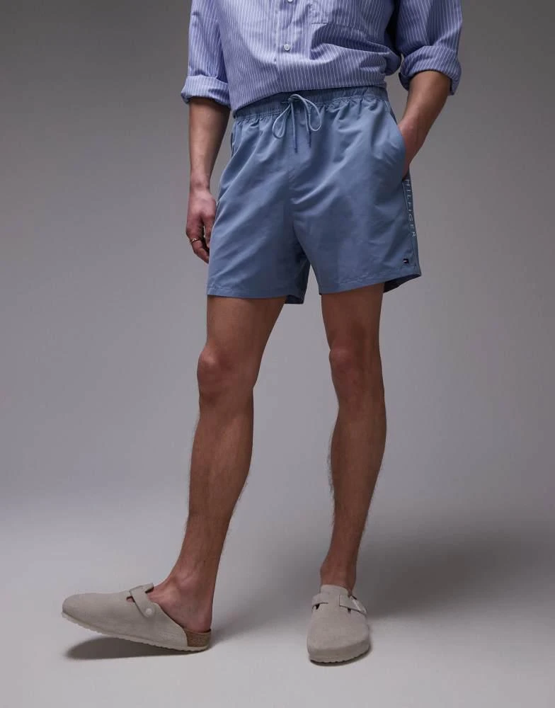 Tommy Hilfiger Tommy Hilfiger drawstring flag taping swim shorts in blue