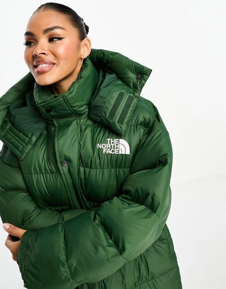 The North Face The North Face Acamarachi oversized long puffer coat in dark green Exclusive at ASOS 2