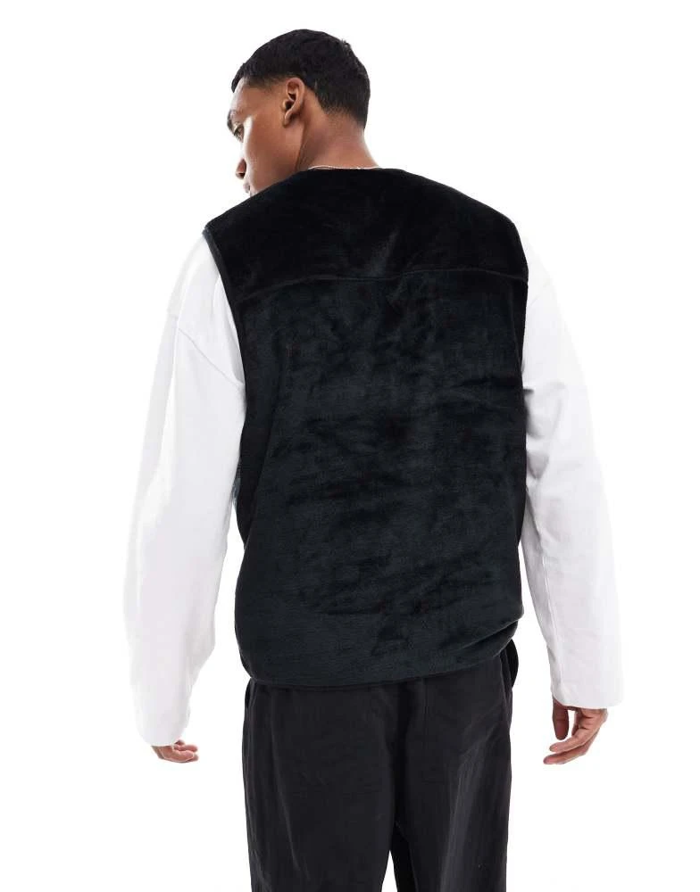 ASOS ASOS DESIGN oversized quarter zip faux fur vest in black 4