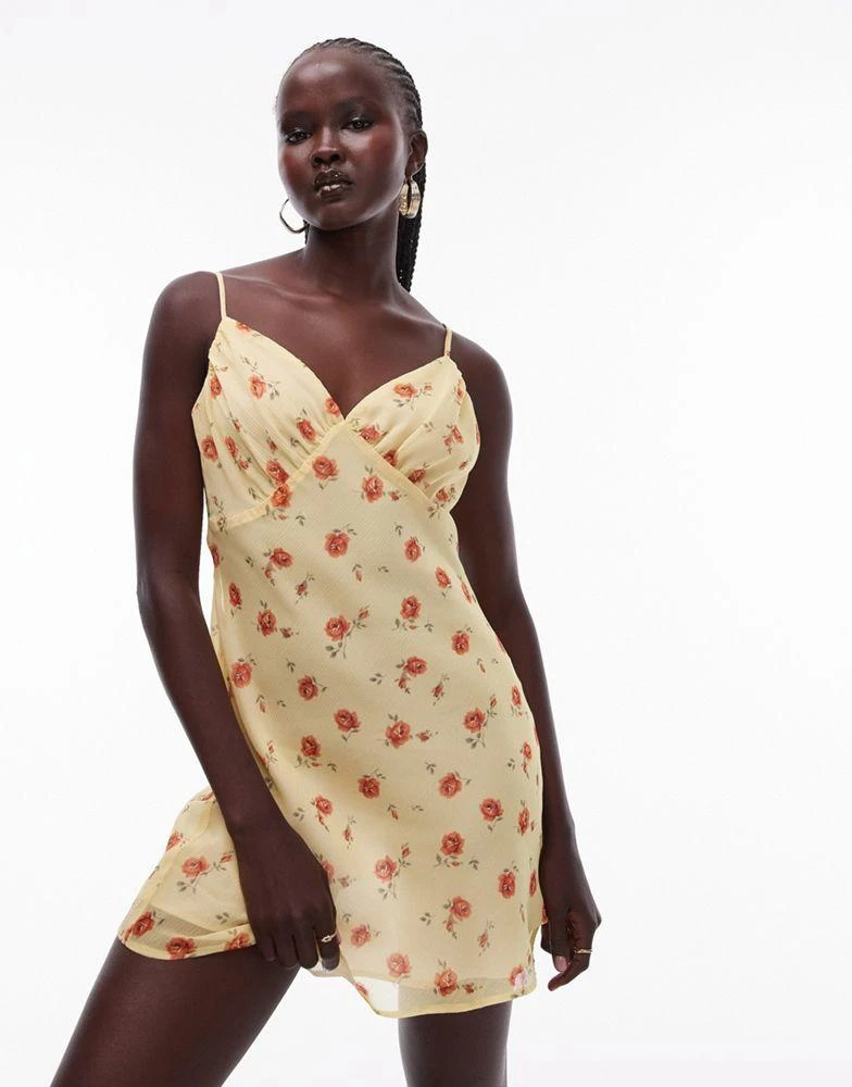 Shop Topshop ruched bust mini slip dress in yellow and red floral