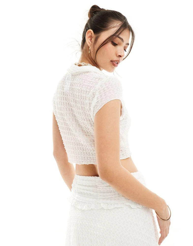 Something New Something New X Cenit Nadir cap sleeved textured shirt co-ord with hem in white 3
