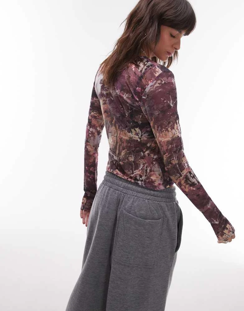 & Other Stories & Other Stories mesh jersey long sleeve top with thumbhole detail in landscape print 3