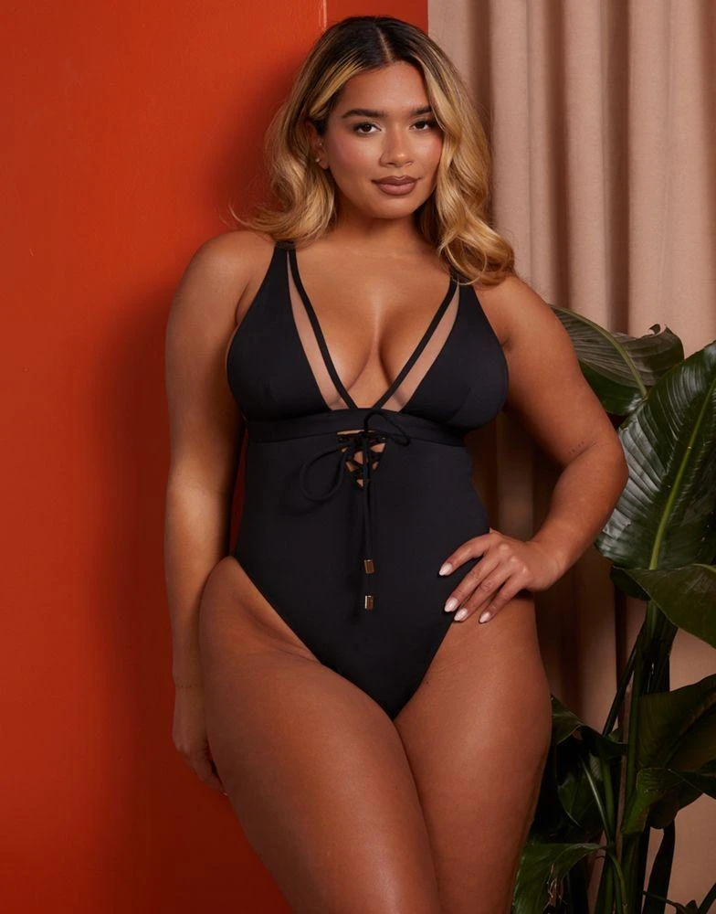 Wolf & Whistle Wolf & Whistle X Natalie Gessey Fuller Bust plunge swimsuit in black with mesh and tie details 1