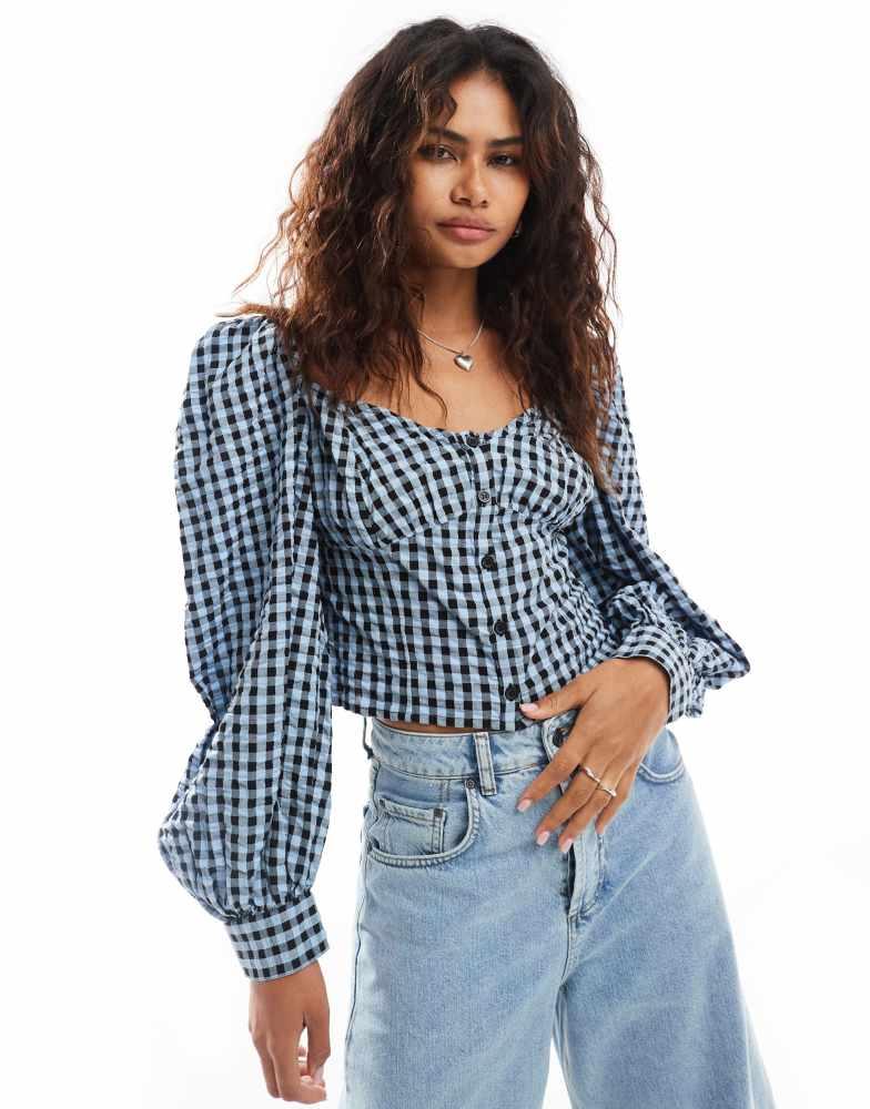 Monki Monki long sleeve seersucker button front blouse in black and dark blue check gingham