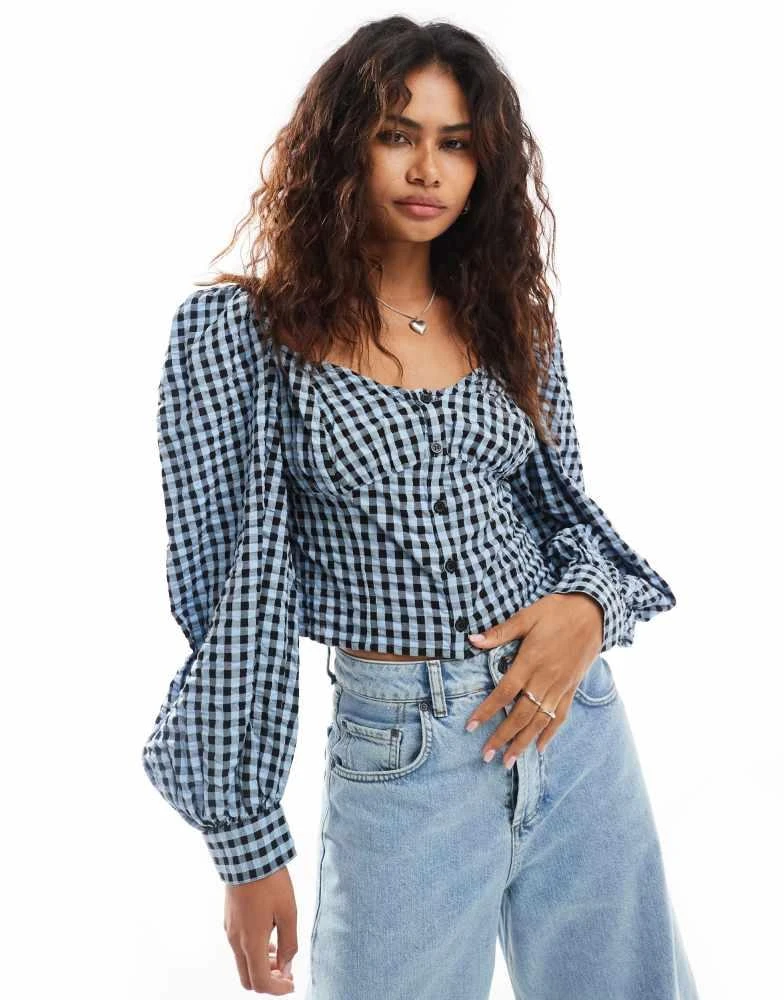 Monki Monki long sleeve seersucker button front blouse in black and dark blue check gingham 1