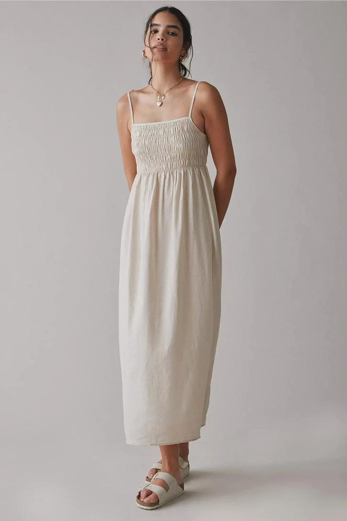 Shop ReMADE By UO Made In LA EcoVero Linen Smocked Maxi Dress on Sale at  BeyondStyle  Get 67% Off ReMADE By UO Made In LA EcoVero Linen Smocked Maxi  Dress with