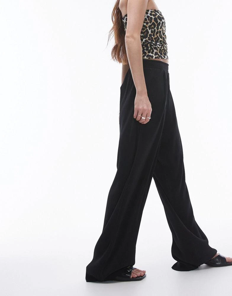 Topshop Topshop plisse balloon leg trouser in black 5