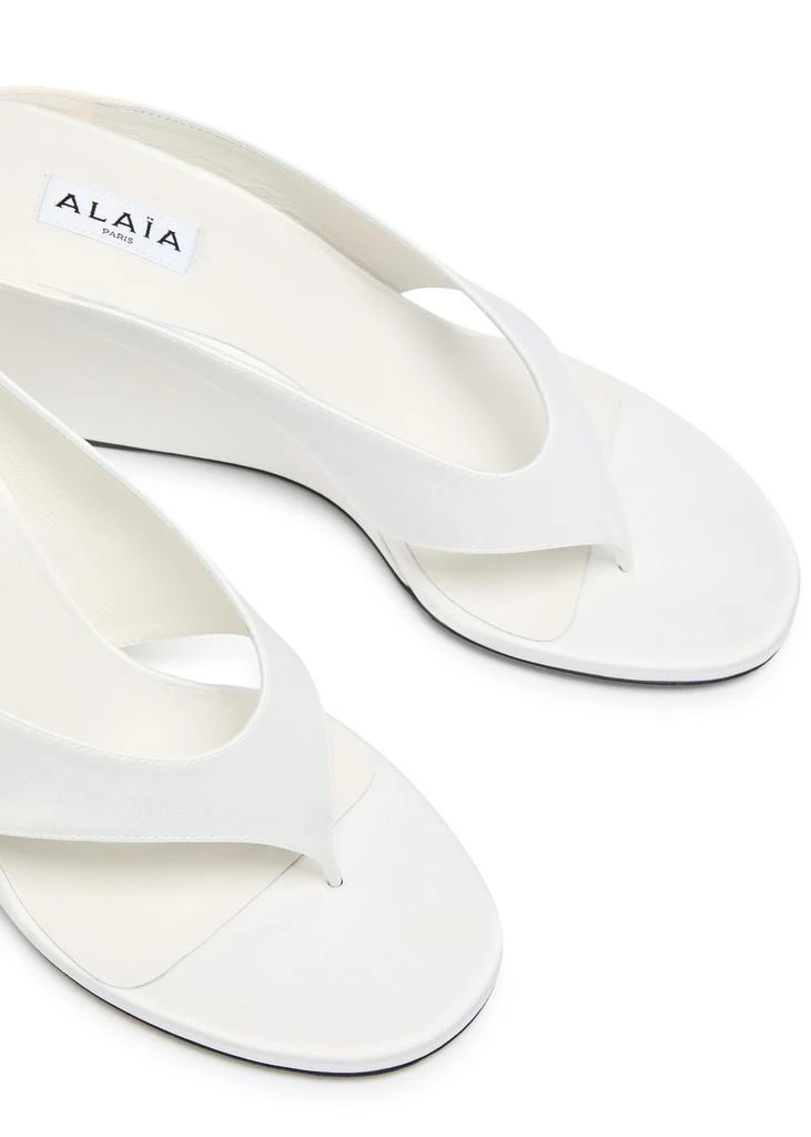 Alaïa Cube 75 satin thong wedge mules 3