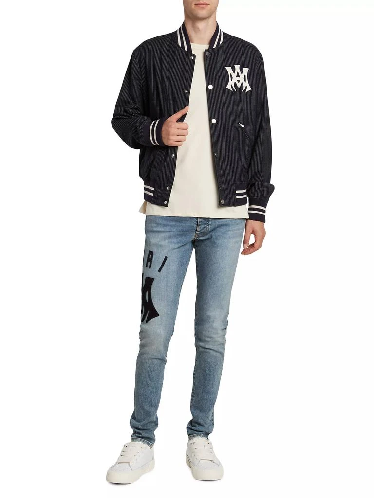 AMIRI Suede Appliqué Logo Skinny Jeans 2
