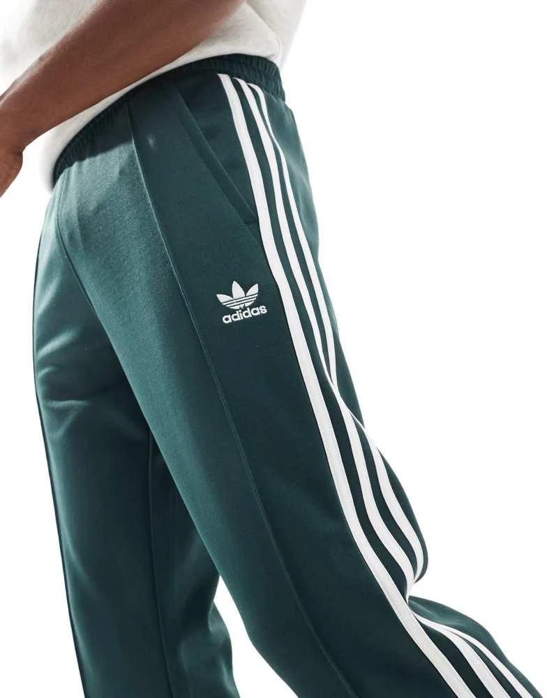 Adidas adidas Originals 70's tracksuit bottoms in mineral green 5