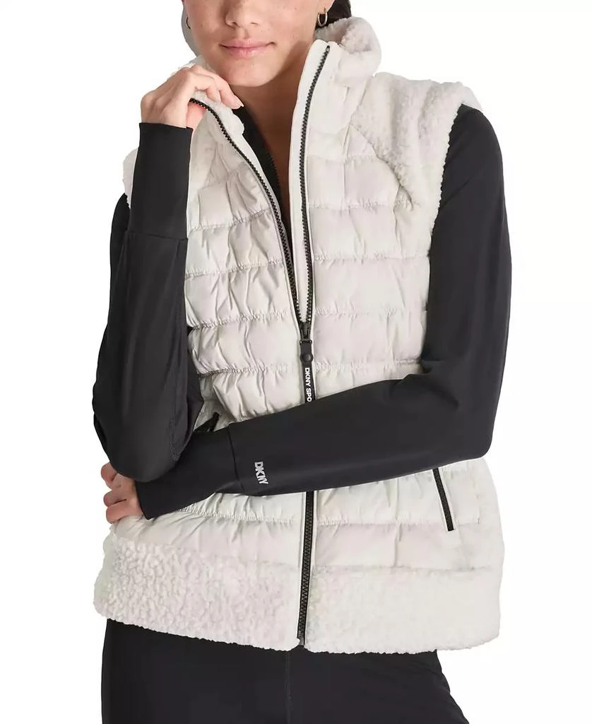 DKNY Women
s Horizontal Channel Quilted Mock Neck Puffer Vest with Sherpa