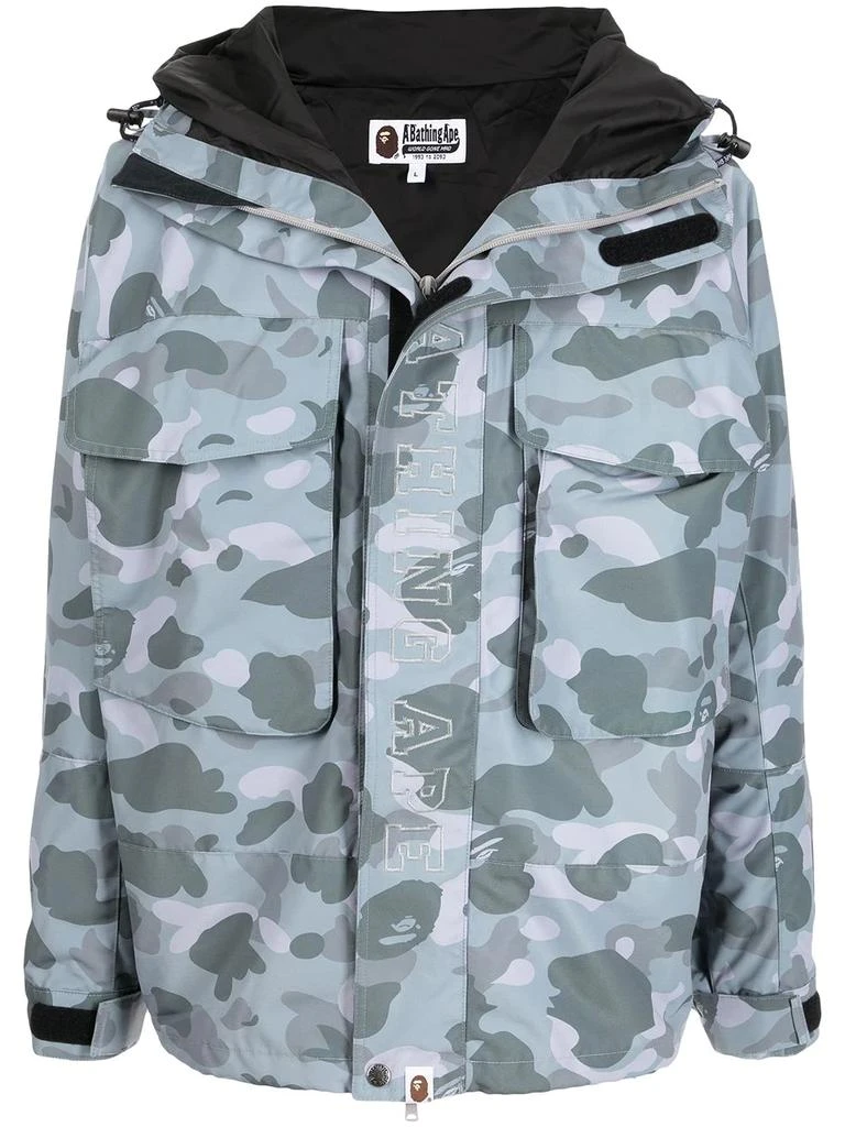 A BATHING APE® camouflage-print hooded jacket - men 1