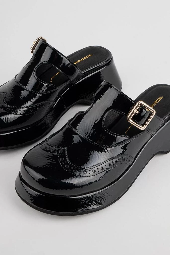 Intentionally Blank Intentionally Blank Everclear Slip On Mule 4