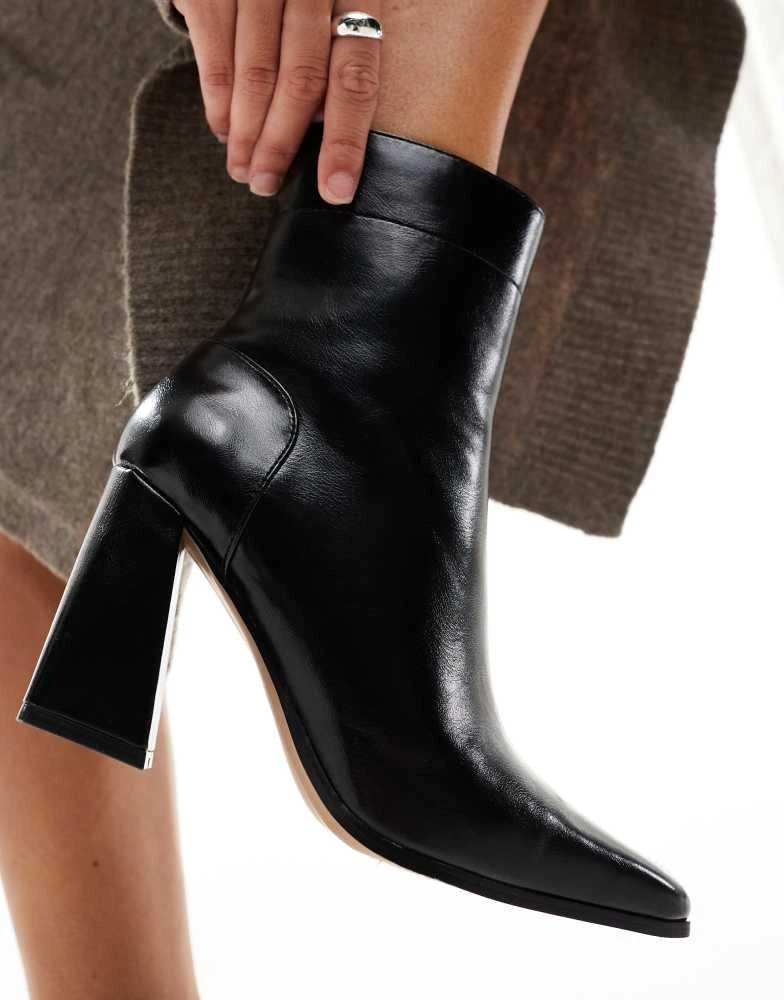 ASOS ASOS DESIGN Everest flared heel boots in black 4