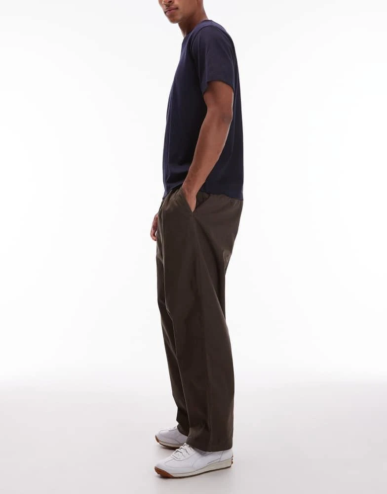 Carhartt WIP Carhartt WIP evan loose tapered fit trouser in brown 3