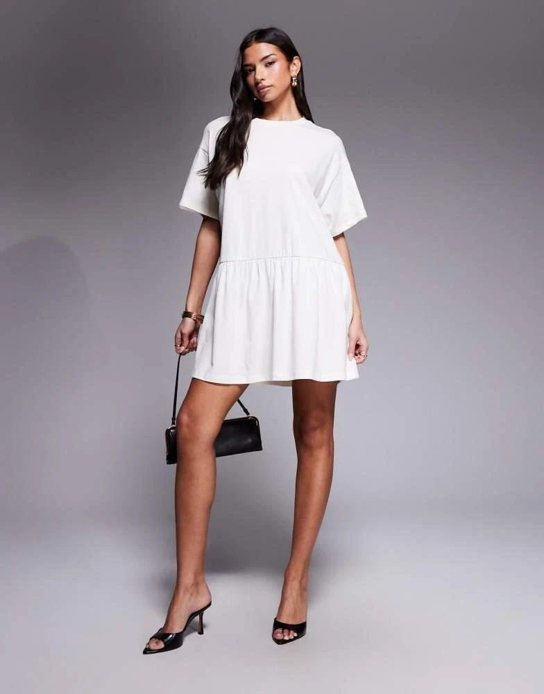ASOS ASOS DESIGN short sleeve dropped waist peplum t-shirt mini dress in cream
