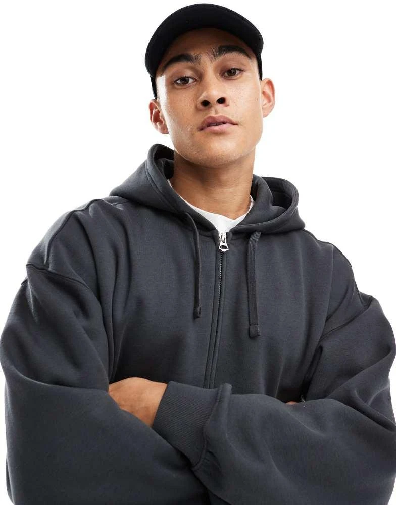 Weekday Weekday boxy fit zip through hoodie in off-black 2