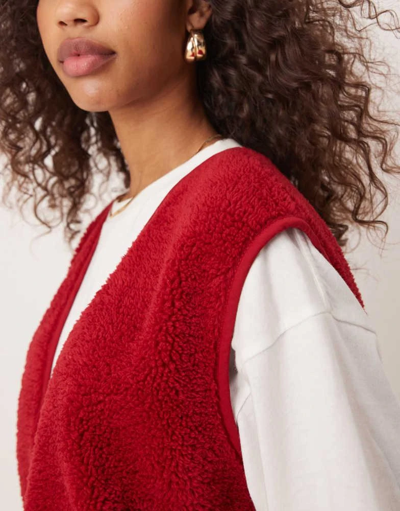 ASOS ASOS DESIGN borg gilet with binding in red 4