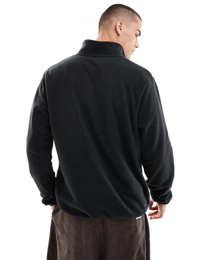 NIKE Nike Swoosh Air polar fleece half zip sweatshirt in black and gold 2