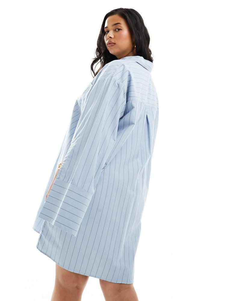 ASOS ASOS DESIGN Curve oversized shirt dress with double pocket detail in blue stripe 4