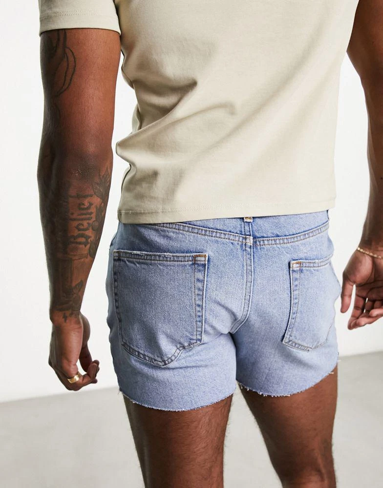 ASOS ASOS DESIGN slim shorter length ripped denim shorts in light blue wash 3