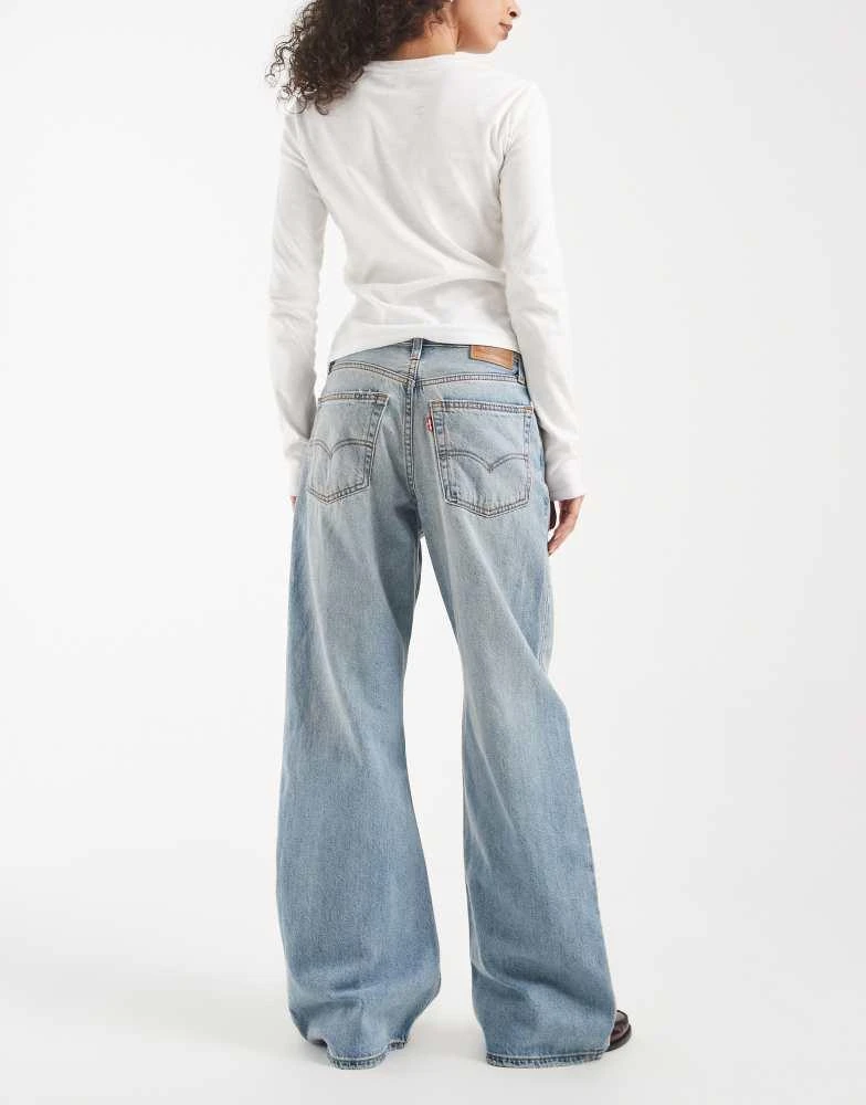 Levi
s Levi
s loose bootcut jeans in yellow tint mid blue 2