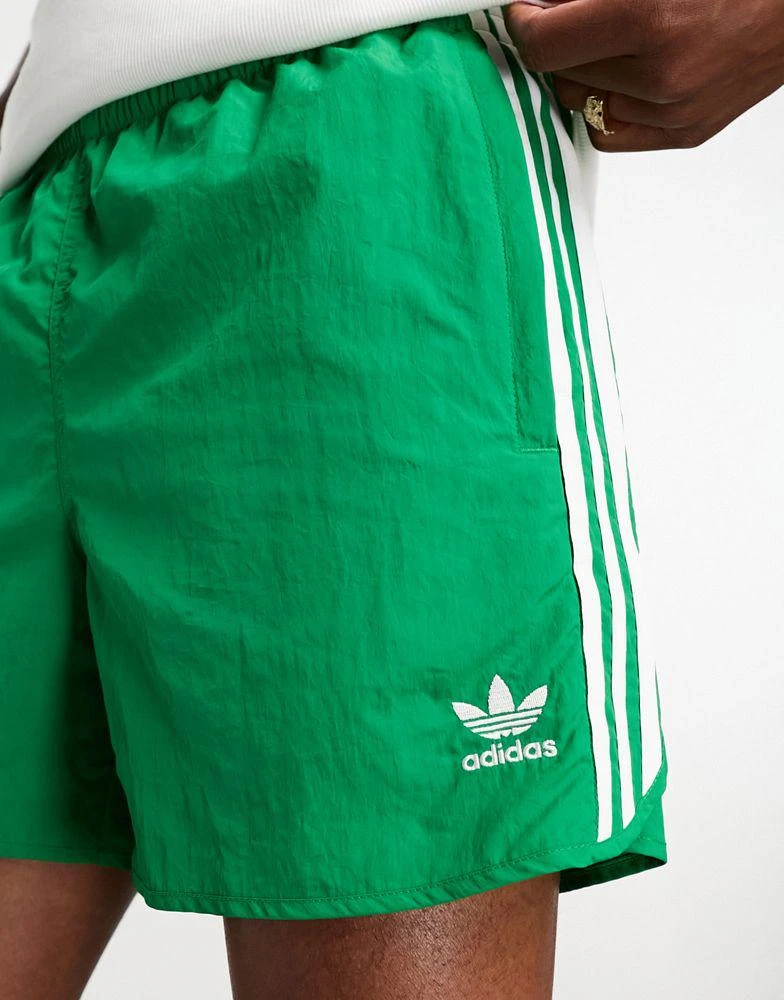 Adidas adidas Originals adicolor classics 3 stripe sprinter shorts in green 2