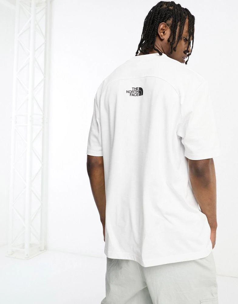 The North Face The North Face NSE Carabiner chest graphic heavyweight oversized t-shirt in white 2
