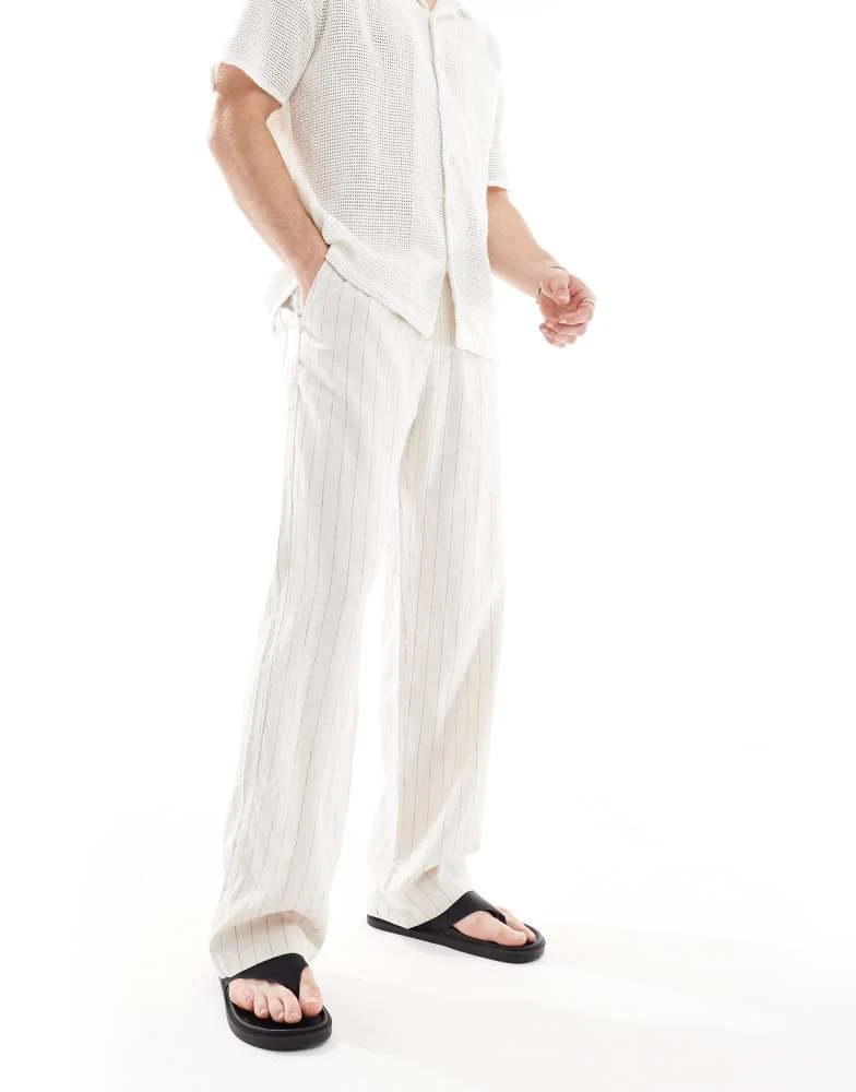 Bershka Bershka linen rich striped trouser in sand 1