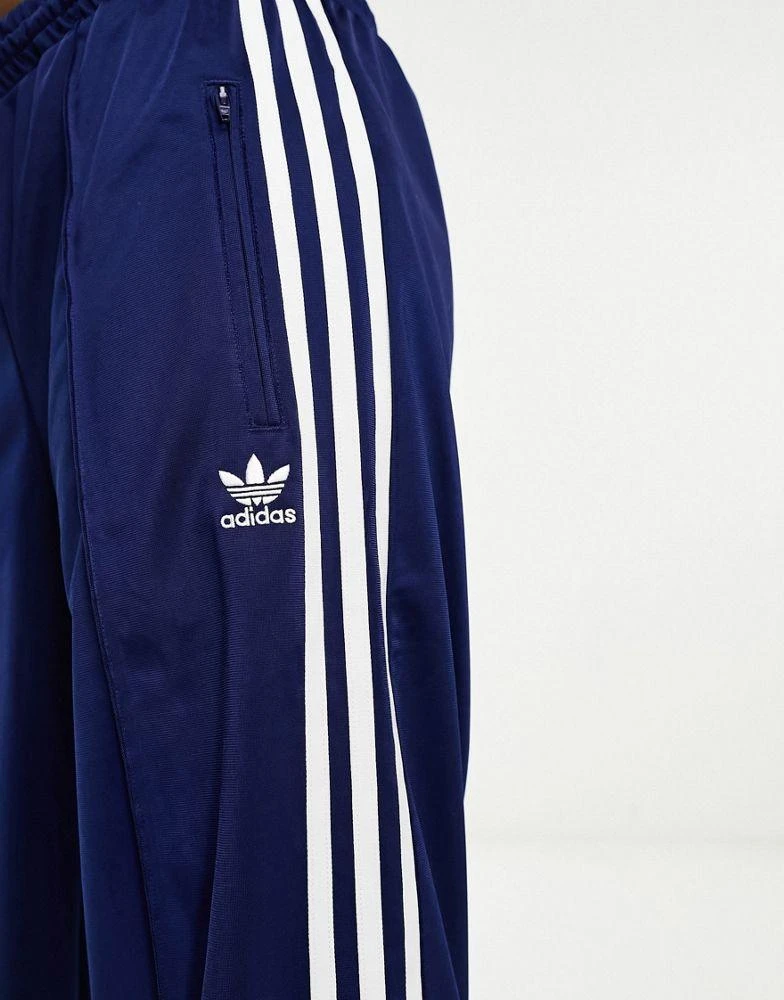 Adidas adidas Originals Firebird Loose track pants in navy 2