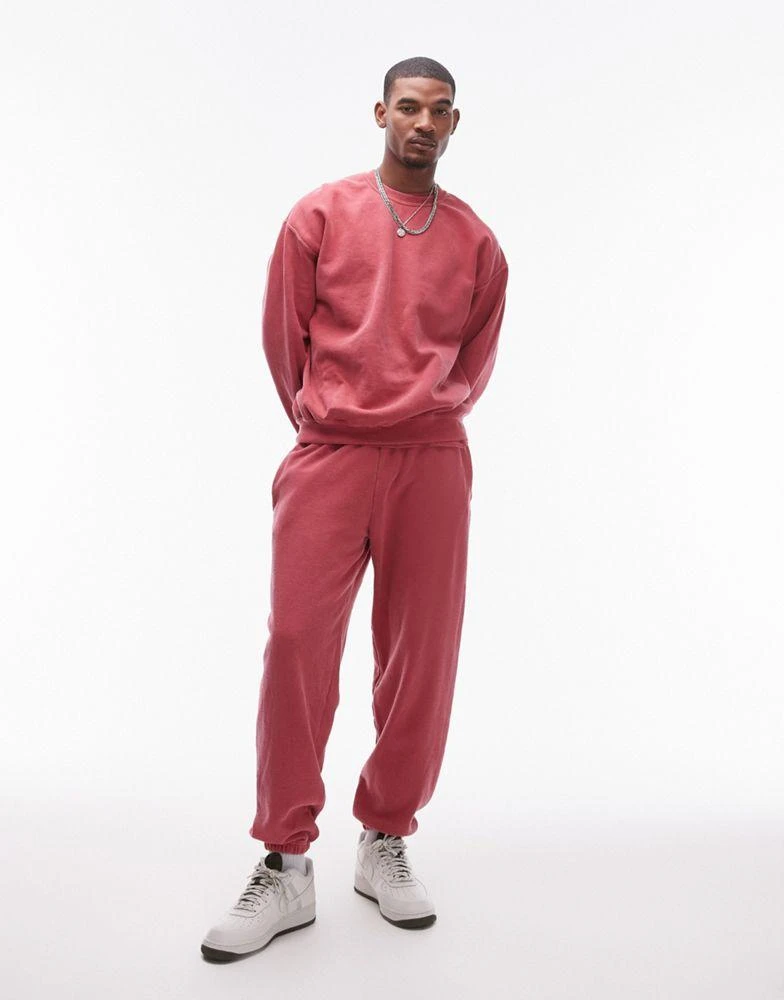 Topman Topman vintage wash oversized jogger in red 1