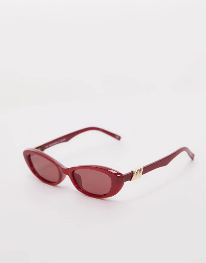 Le Specs Le Specs the whisperer oval sunglasses in garnet red 2