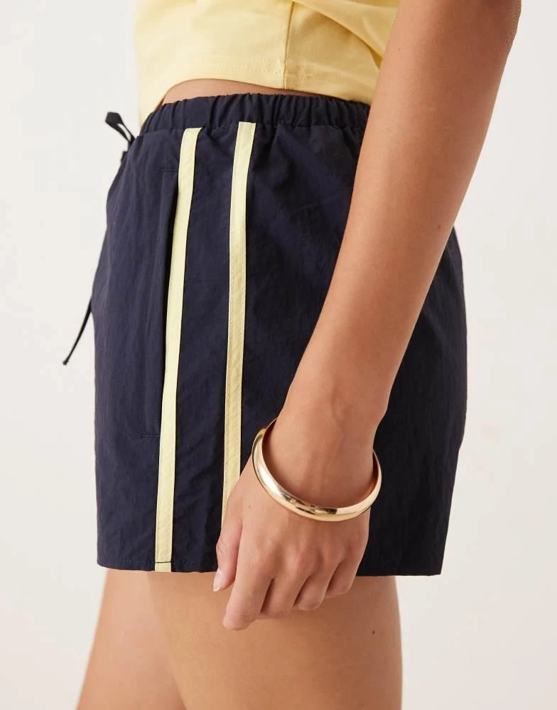 Motel Motel riu runner shorts in navy 5