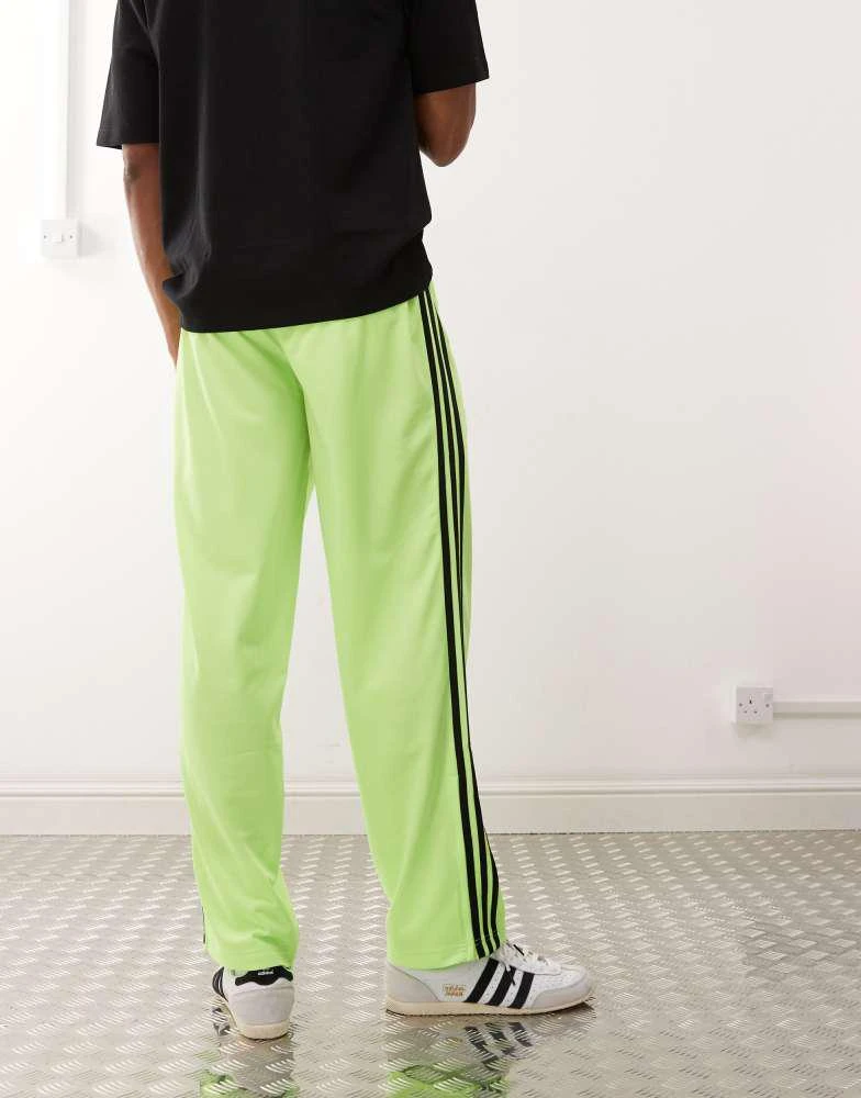 Adidas adidas Originals Firebird track pants in green and black 4
