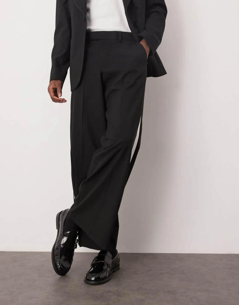 ASOS ASOS DESIGN smart loose fit tuxedo trousers in black with white side stripe 4