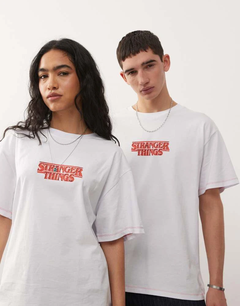Reclaimed Vintage Reclaimed Vintage x Stranger Things unisex oversized t-shirt with character back print in white 3