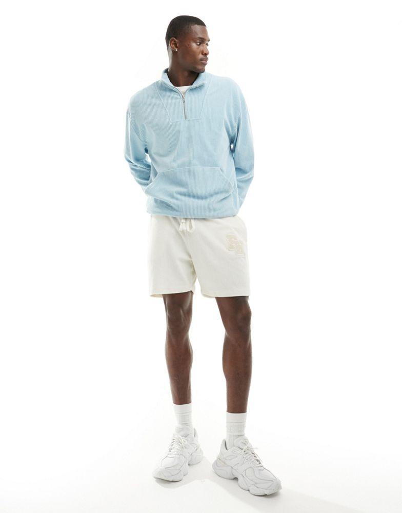 ASOS ASOS DESIGN oversized texture sweatshirt with funnel neck in blue