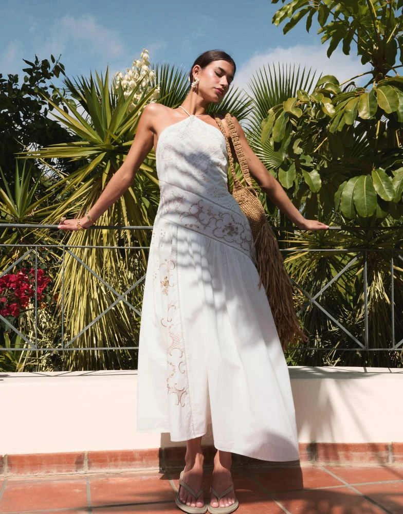 ASOS DESIGN halter tonal spliced maxi dress with asymmetric panel in ivory ASOS DESIGN halter tonal spliced maxi dress with asymmetric panel in ivory