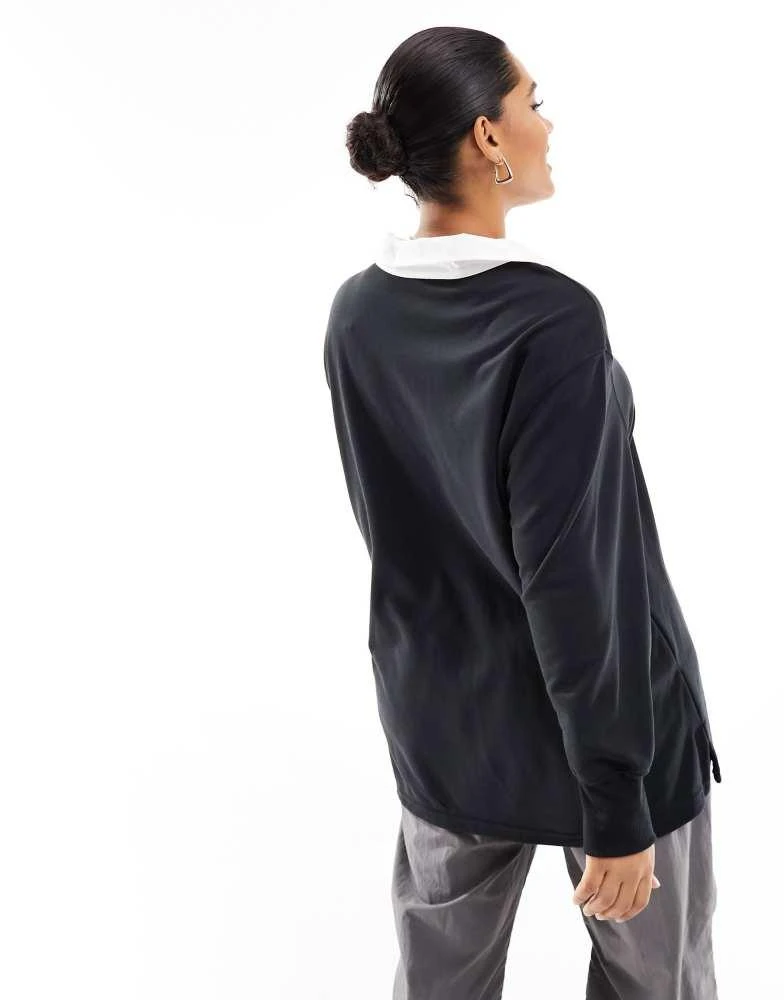 NIKE Nike Plus essential oversized long sleeve polo top in black 3