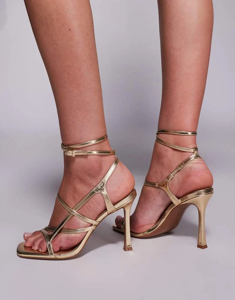 ASOS ASOS DESIGN Nutty caged high heeled sandals in gold 4