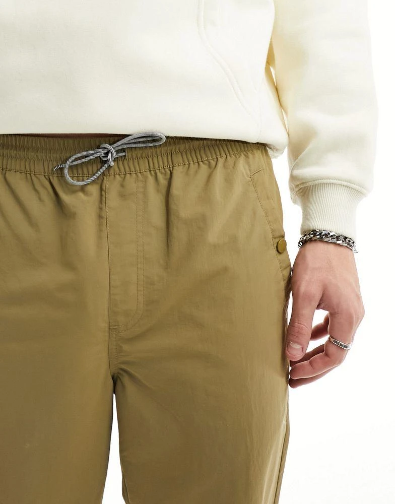 Farah Farah hawtin technical relaxed tapered trousers in beige 2