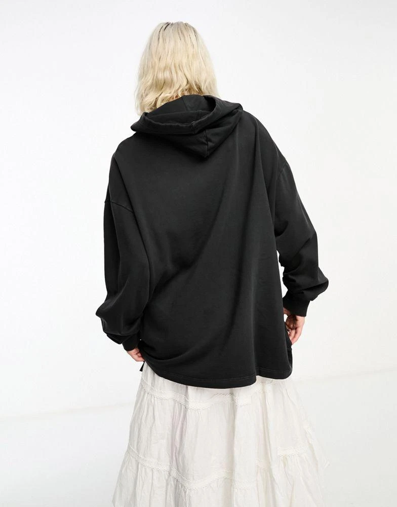 ASOS ASOS DESIGN oversized hoodie with rogues indie graphic in black 2