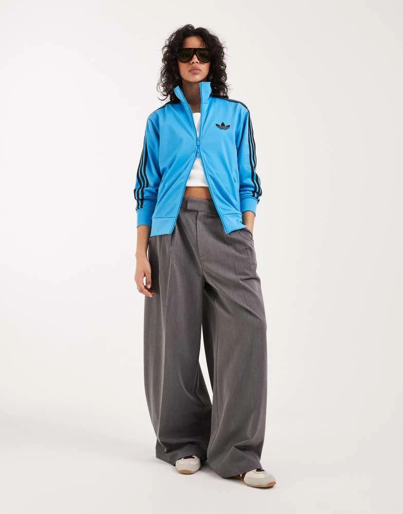 Adidas adidas Originals Firebird loose track top in blue and brown 2