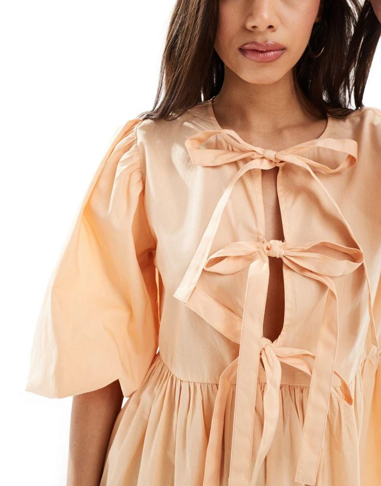 ASOS ASOS DESIGN bow tie front mini smock dress in peach fuzz 2