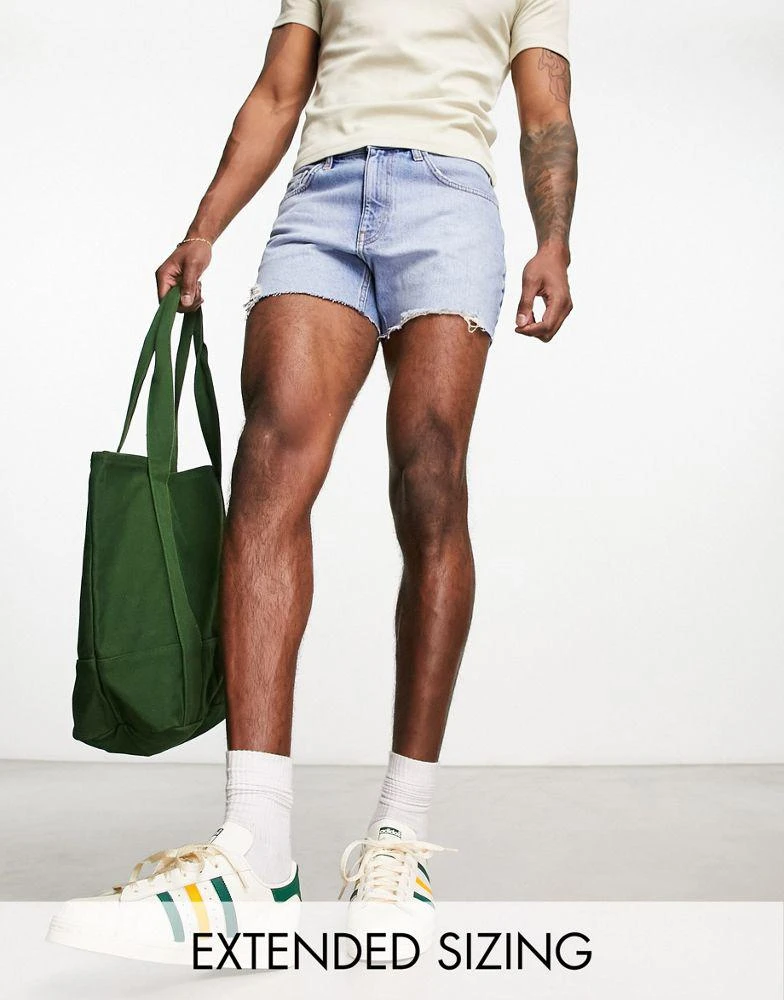 ASOS ASOS DESIGN slim shorter length ripped denim shorts in light blue wash 1