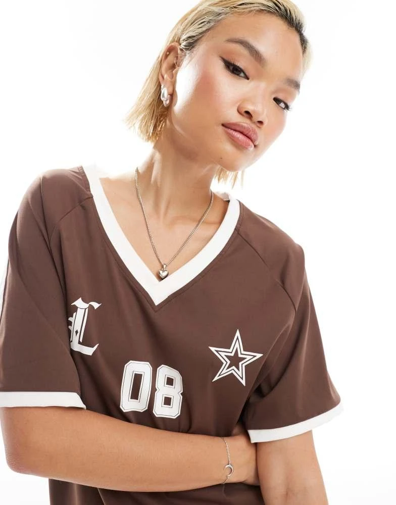 Lioness Lioness v neck sports jersey top in brown with white contrast trims 2