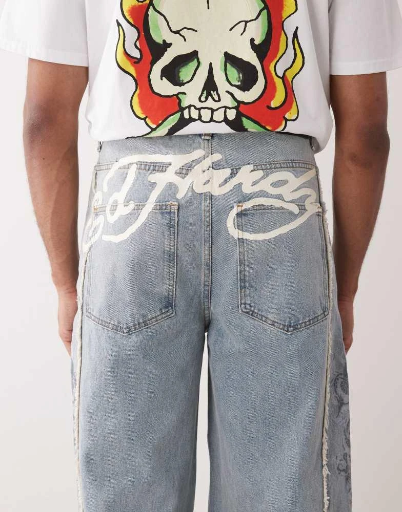 Ed Hardy dragon raw seam denim jeans in blue vintage wash – On